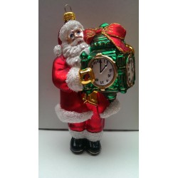 Santa Claus standing with a clock